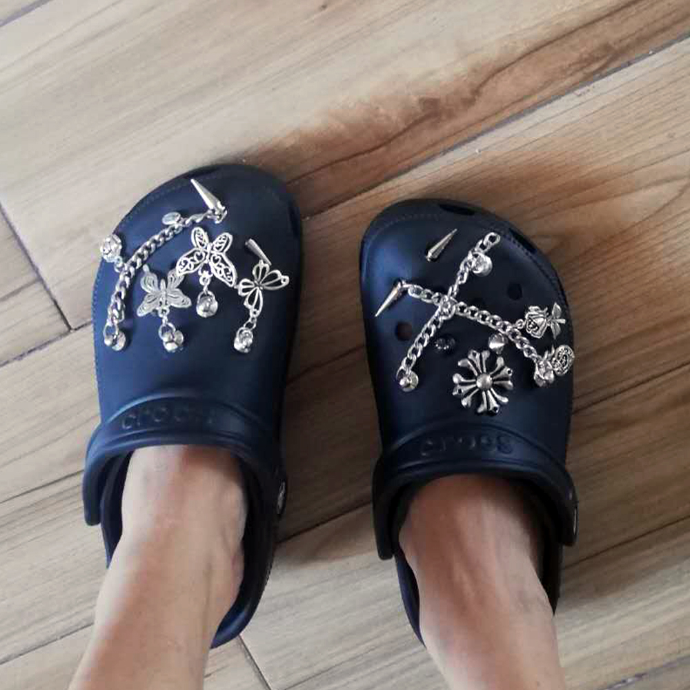 Black crocs customised with silver jibbitz💿, Gallery posted by  Bellas.arch1ves