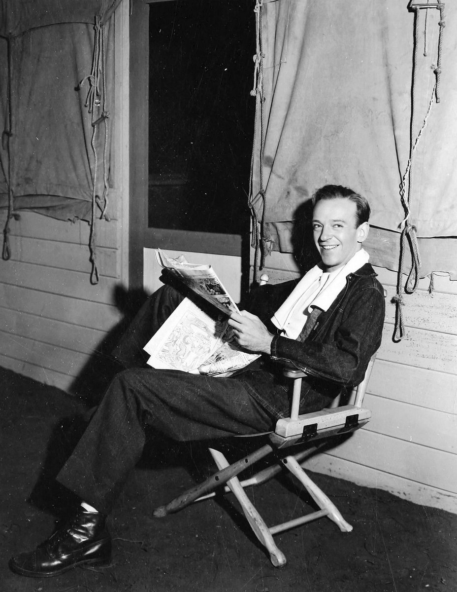 kingoftaps's tweet image. Fred Astaire reading comic strips while on set of "You'll Never Get Rich" (1941)