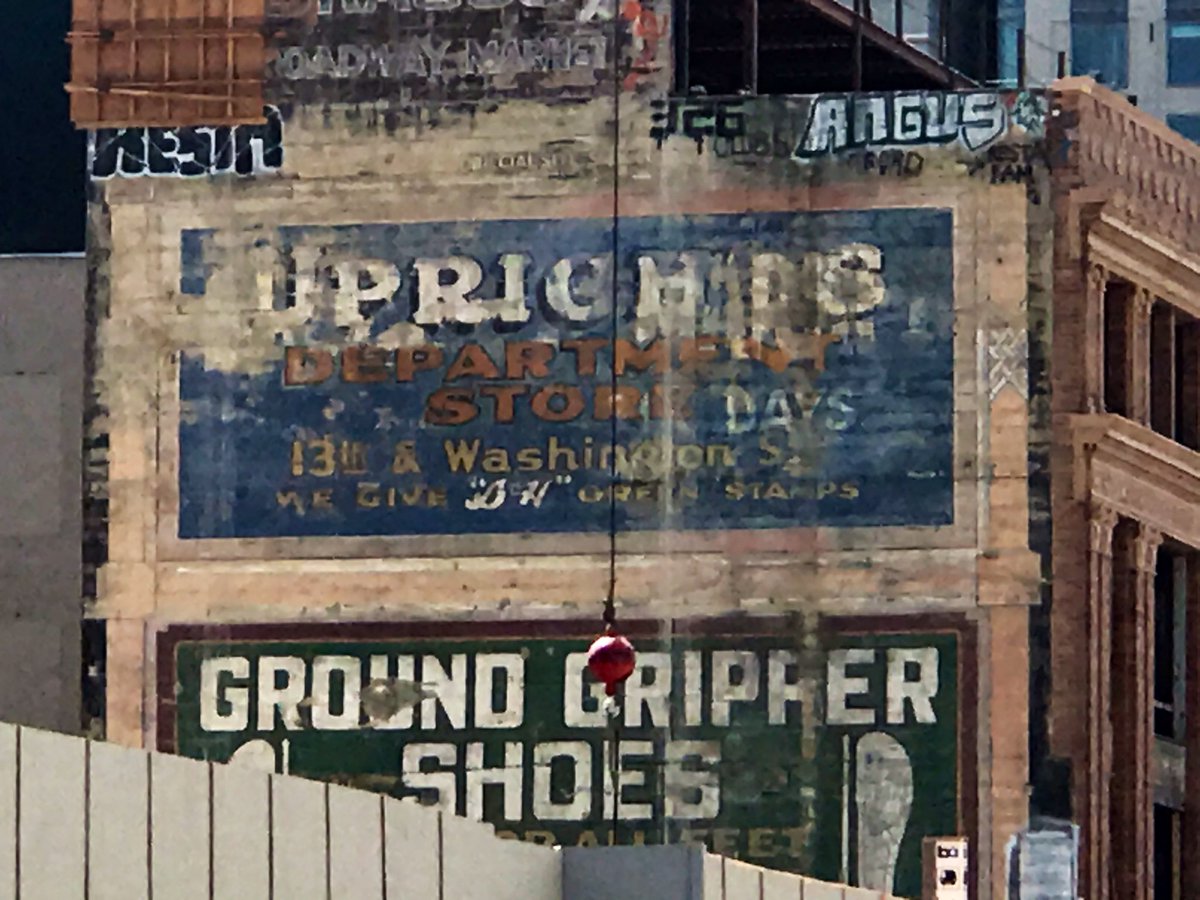 Looking south from 19th Street at uncovered billboards in the 1700 block of Broadway for a department store and for shoes Thursday, September 13, 2020 in Oakland, California