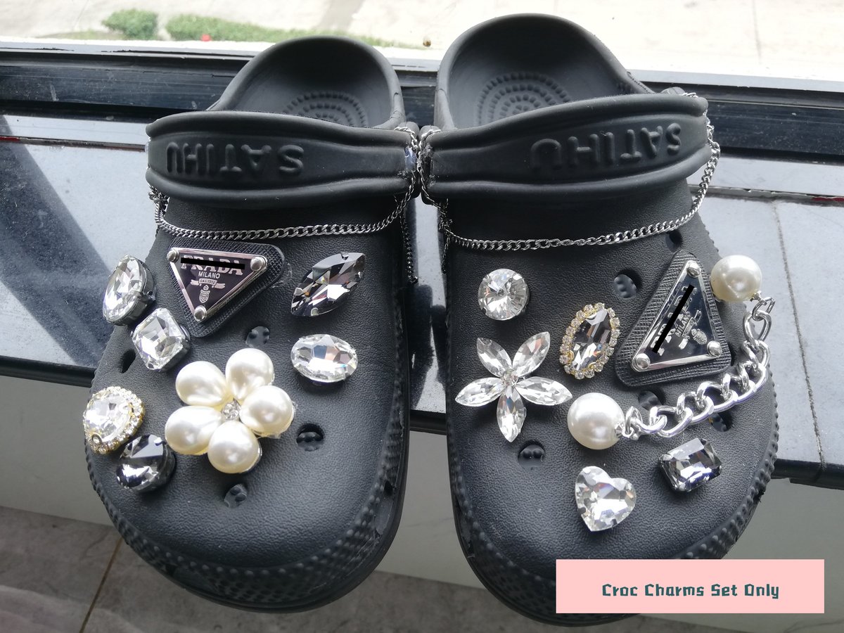 Black crocs customised with silver jibbitz💿, Gallery posted by  Bellas.arch1ves