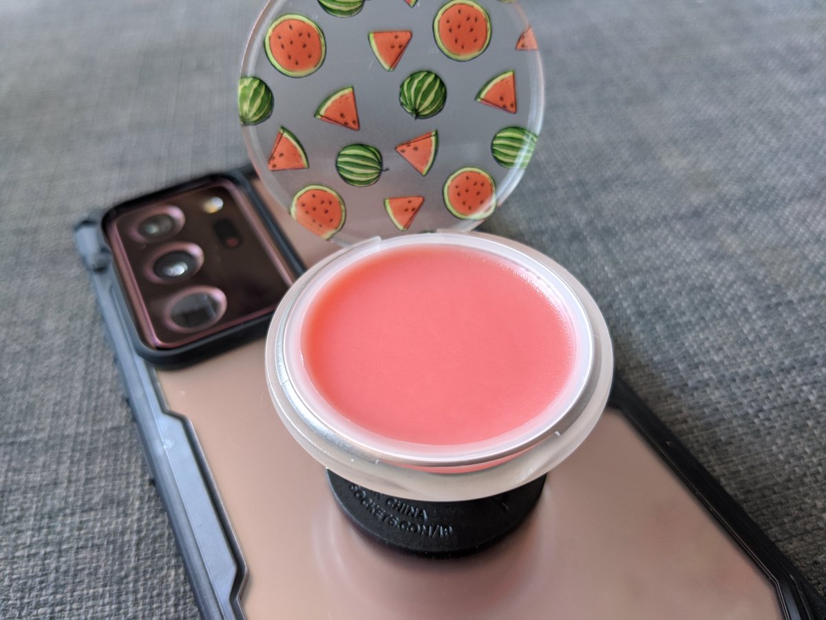 holly's tweet photo. MAN I wish this had existed when I was on accutane. @PopSockets made a PopGrip phone holder thingy full of lip balm! This one is watermelon, but there are others, and it's refillable: https://t.co/Qwpusrw1mS
#gifted #phonebetter @PopSocketsEU https://t.co/JOxtbzMXQS