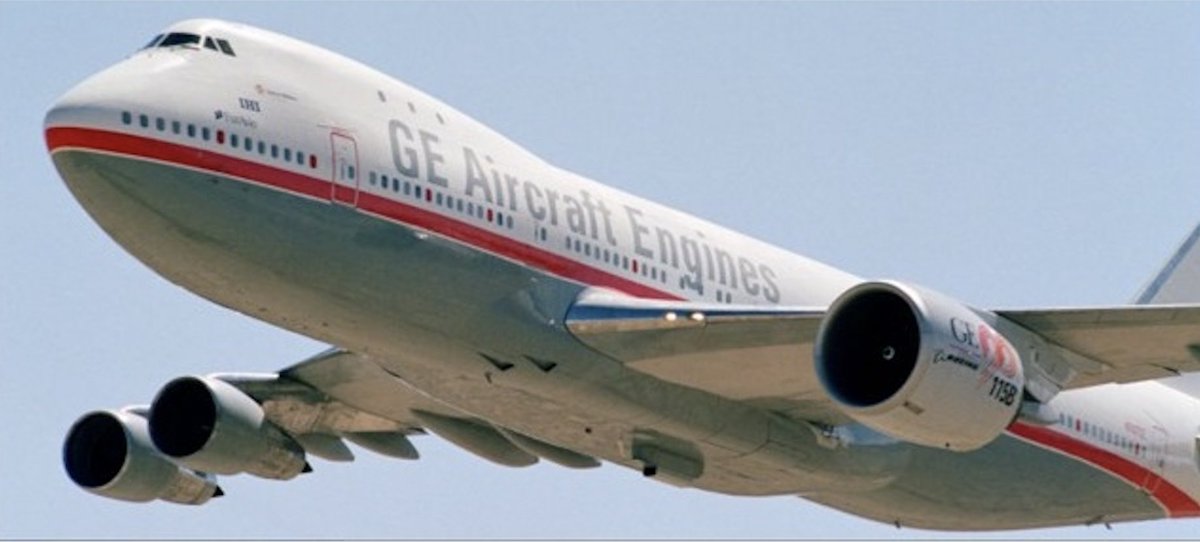 GE_Aerospace's tweet photo. #OTD 2002: The GE90-115B engine took to the skies for the first time on our 747 Flying Test Bed. Less than a year prior, the -115B set a world record as the most powerful aircraft engine with 127,900 pounds of thrust. #AvGeeks, what is the new thrust record set by the #GE9X? 🤔 https://t.co/zmQk69wnjU