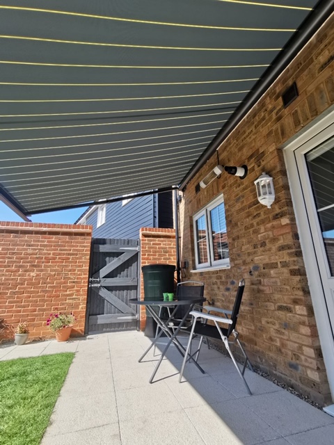 absblinds's tweet photo. This lovely, stylish awning has been fit to a modern house on the Finberry Estate in Ashford, complete with an awning heater, perfect for the cooler evenings. Call now for a quote on 01580 765169 or pop in to our showroom to see some our Awning display.#TENTERDEN#FINBERRY#AWNINGS https://t.co/vZ7teqZr3K
