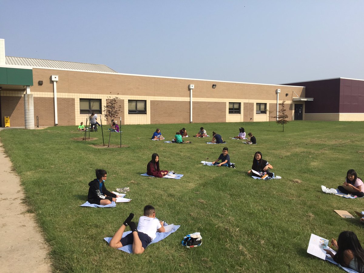 Comets hard at work while enjoying a mask break and the beautiful weather today!  All the world is a classroom!