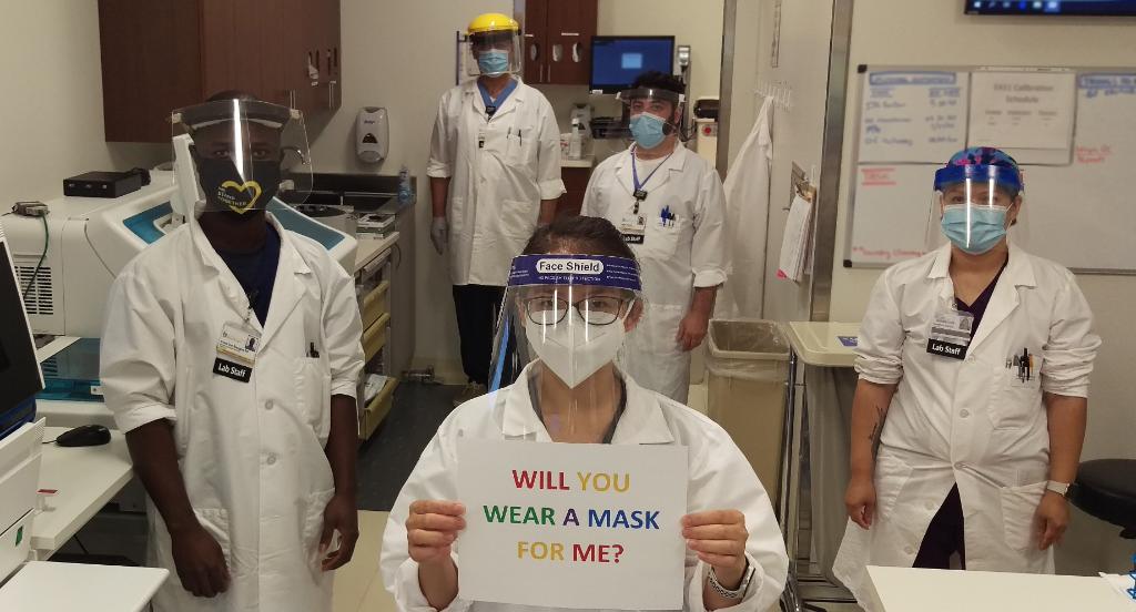 uihealthcare's tweet photo. The #HealthCareHeroes in our lab need you to protect them and others in the community. Will you wear your mask for them? #MaskUpIA #StepUpMaskUpIA #COVID19 https://t.co/ngA50KGR5T
