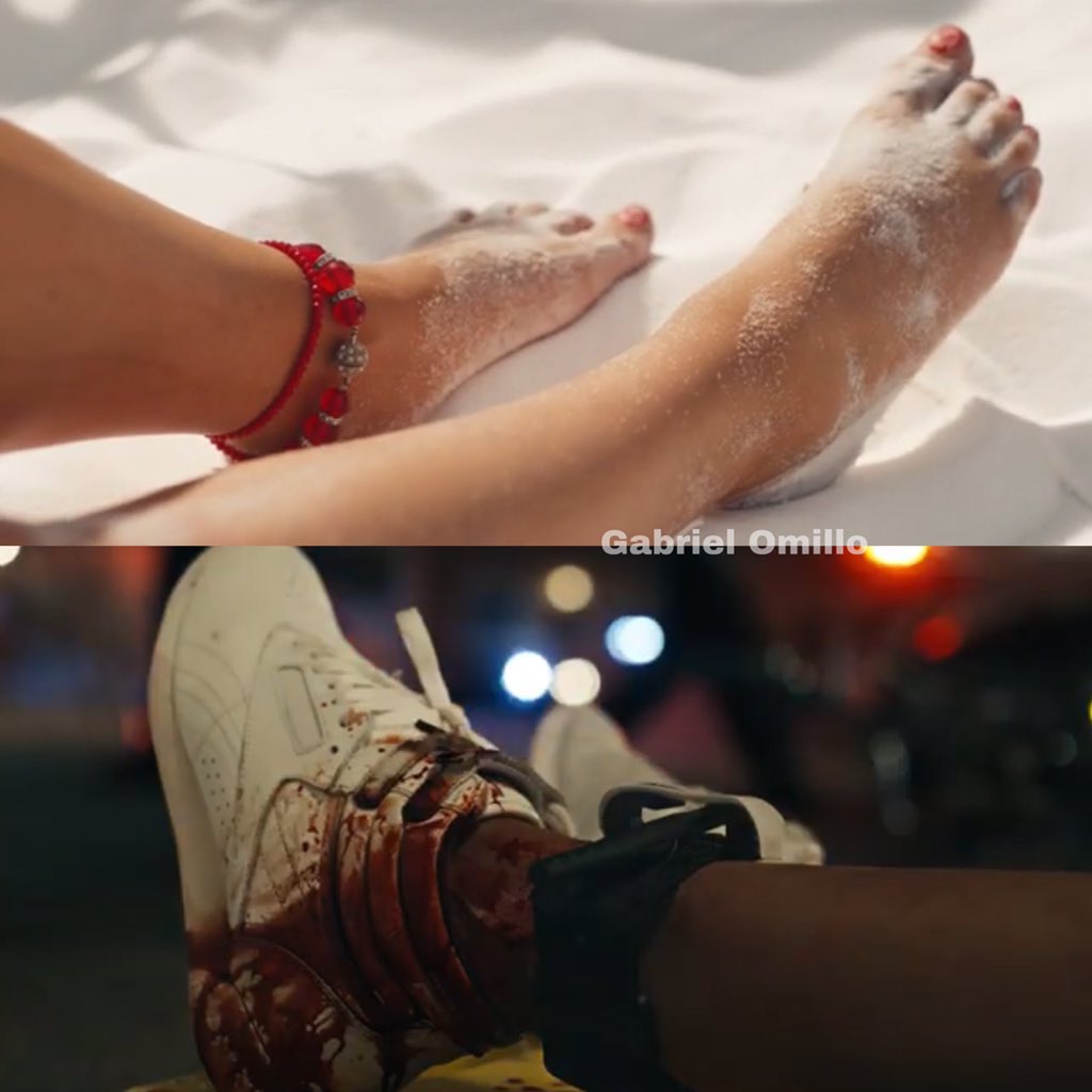 Next scene shows us a representation of the accident Gaga went through but how she imagines it in her head. In real time, at this point she died. We see her foot with a red bracelet symbolizing the blood and a reference to The Color of Pomegranates (1969). Also the bike