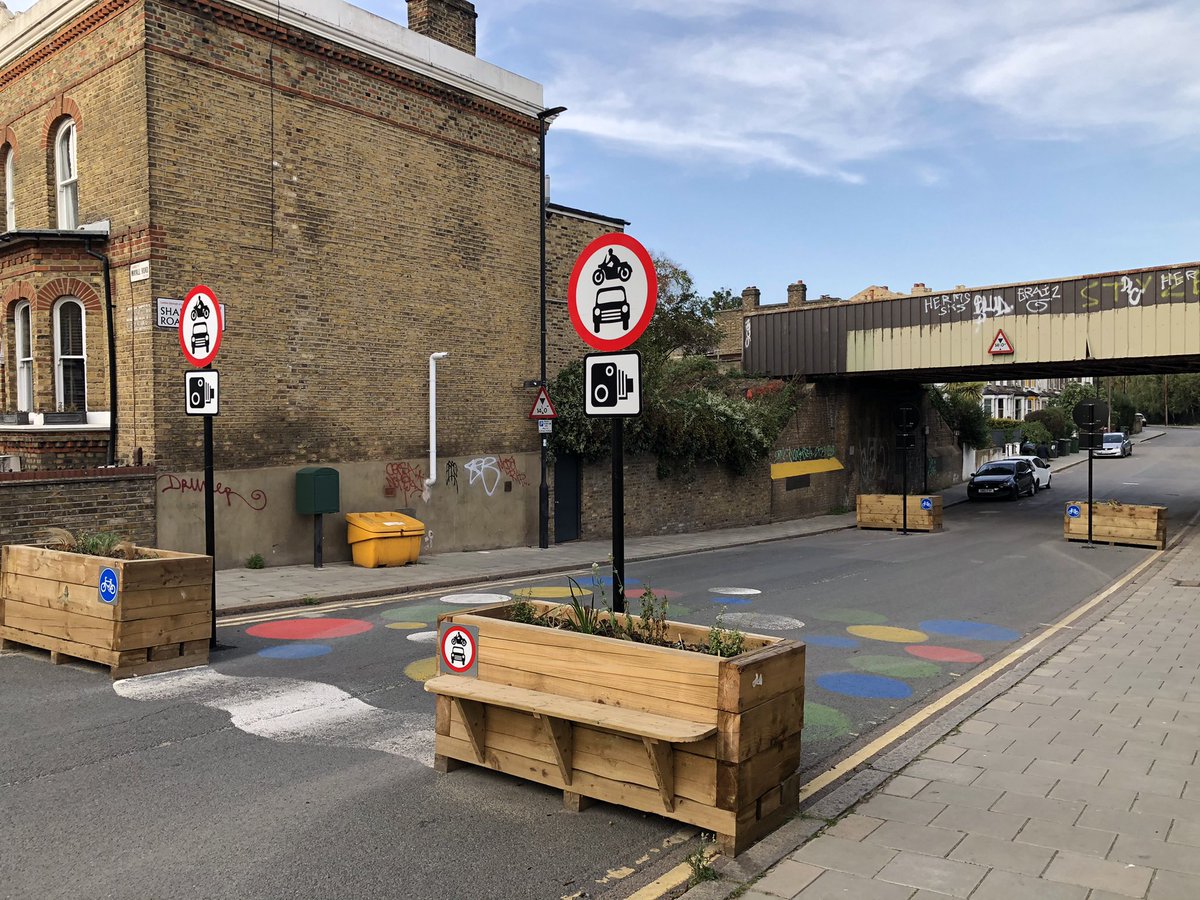 This is traffic filter on Shakespeare road - I like the little benches that are appearing on the planters, nice idea (Still think this would be better with a folding bollard in the middle)
