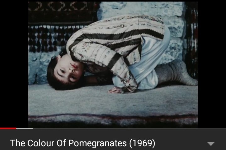 Then she follows the dark horse guy which is going to show her how it all happened because she is confused. As soon as she enters, we see the guy banging his head on a pillow, which was then the car scene, also being a reference to The Color of Promegranates (1969)