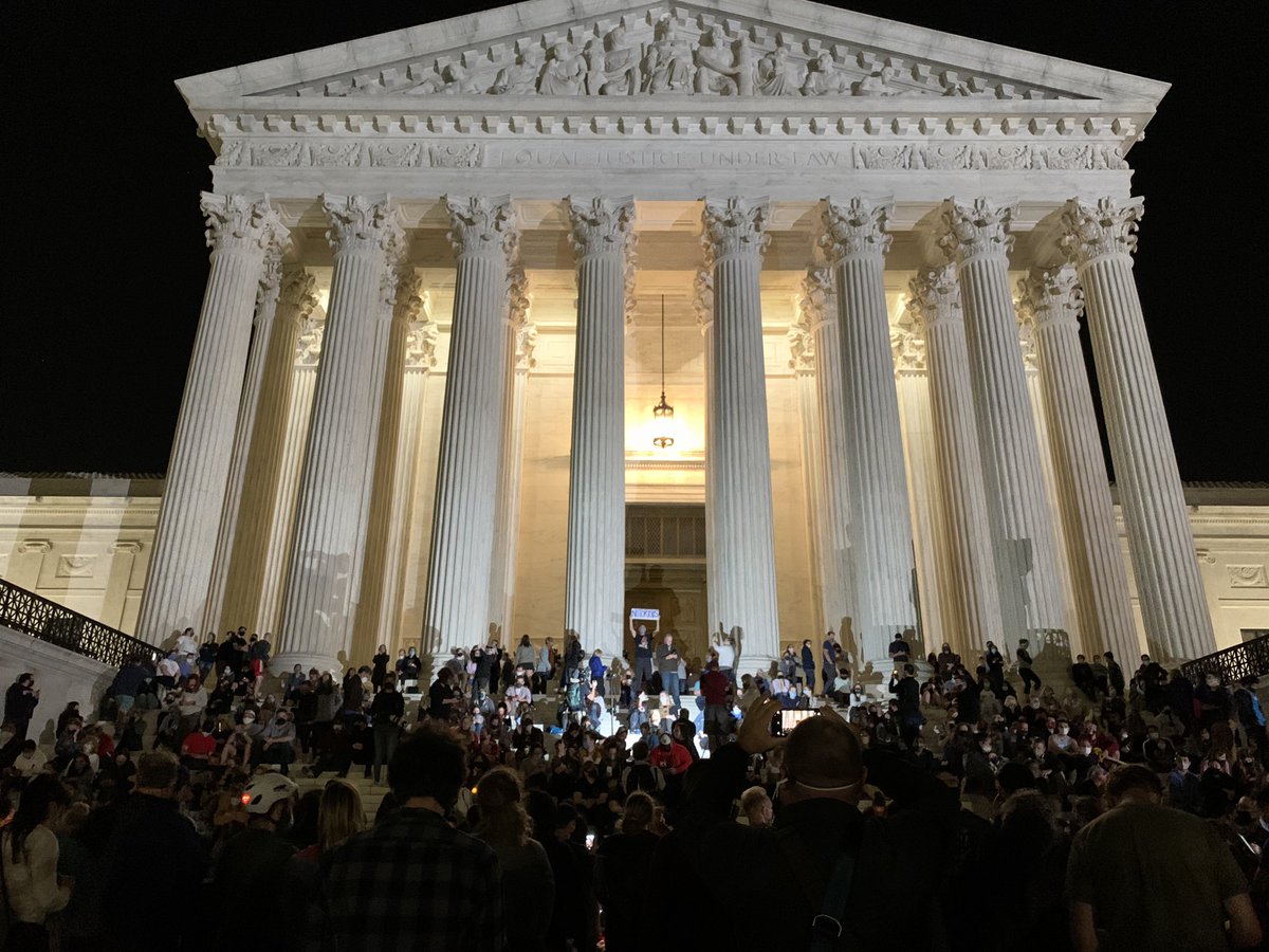 Hundreds are paying their respects to Justice Ginsburg outside the Supreme Court