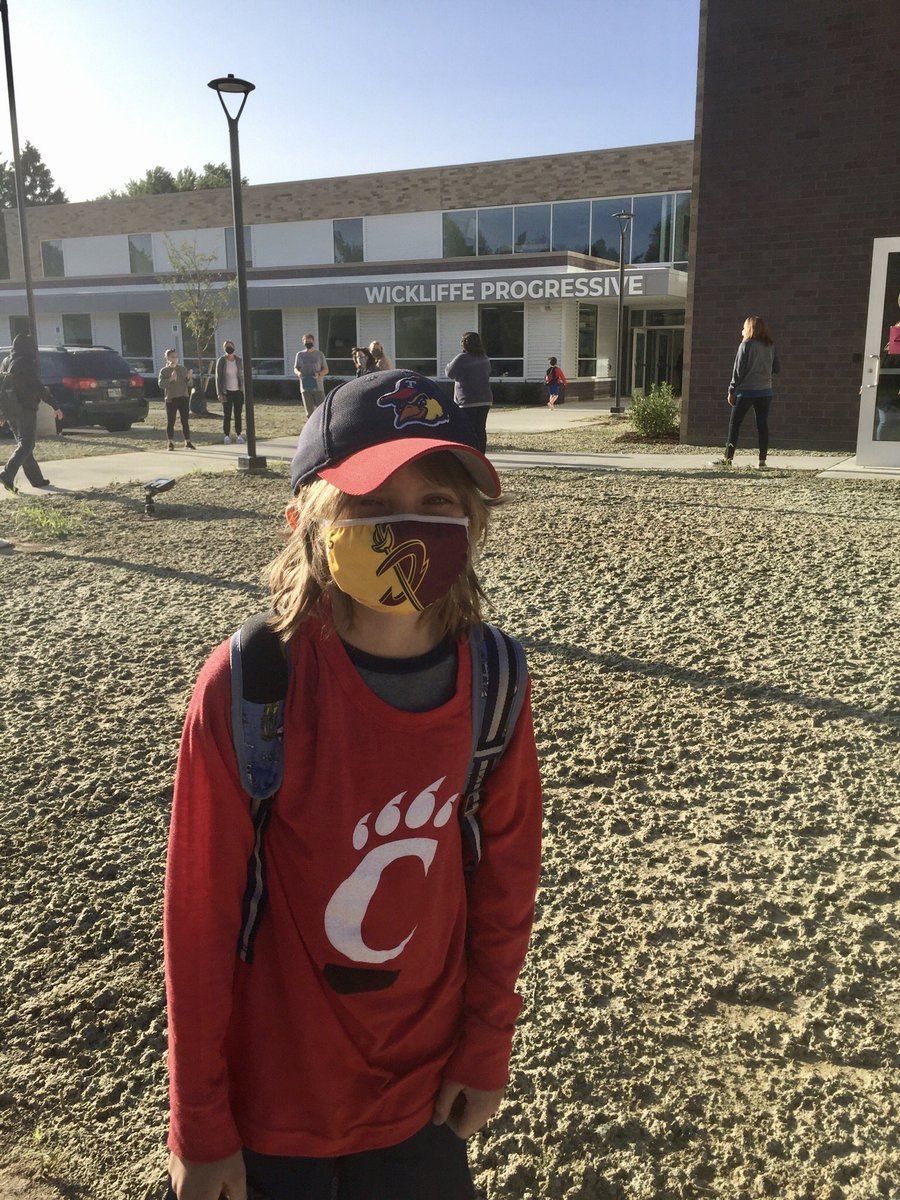 testaon's tweet image. E choosing his attire with his heart for the first day back to school... his city championship Mud Hens hat, his @Cavs mask, and the shirt to root on his favorite freshman @EthanWright_25! @GoBearcatsFB @jaysonfrance