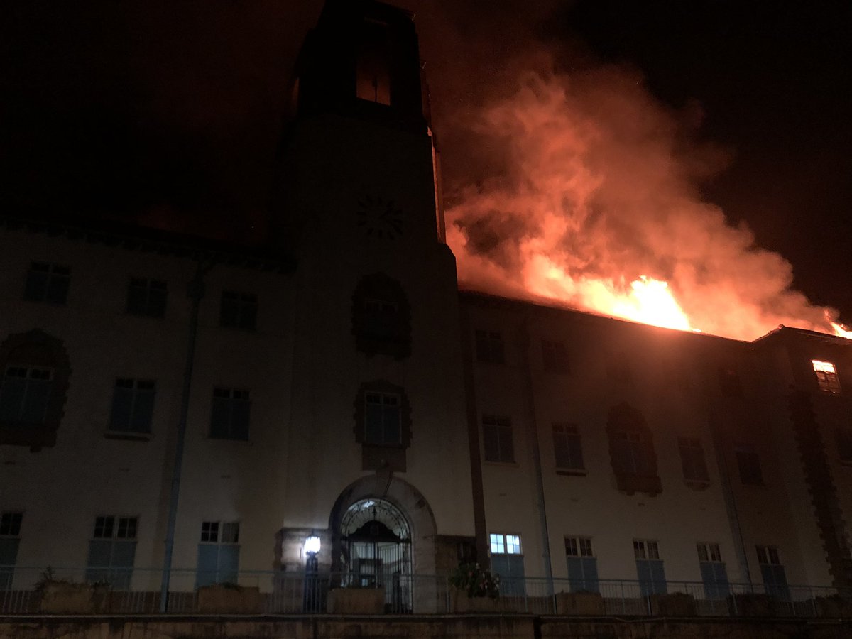 The Main Building - Ivory Tower has caught fire. The fire brigade is on ground.