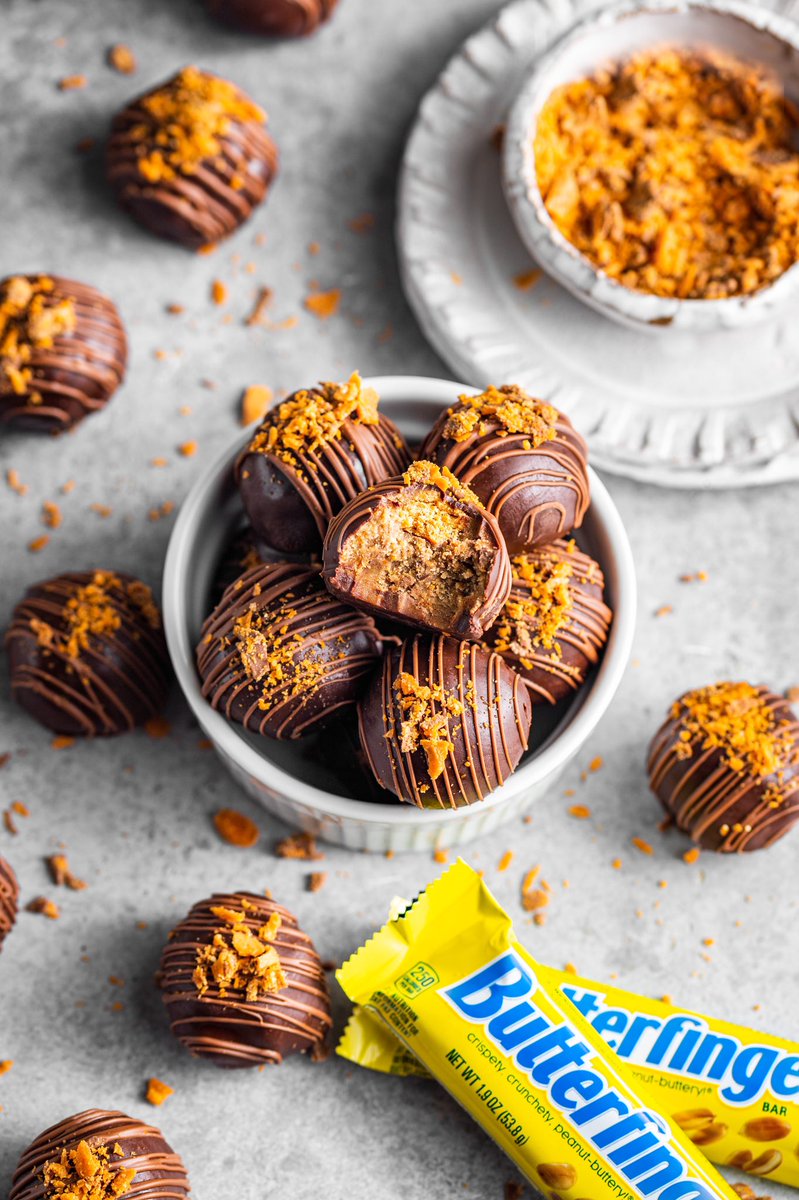 mikebakesnyc's tweet photo. Butterfinger Cookie Dough Bites are the best! These no-bake bites feature a cookie dough filling loaded with chopped @butterfinger and coated with chocolate. The best part? They're quick and easy to make! #bakebetterwithbutterfinger #butterfinger #ad https://t.co/oPVuVuNhAa