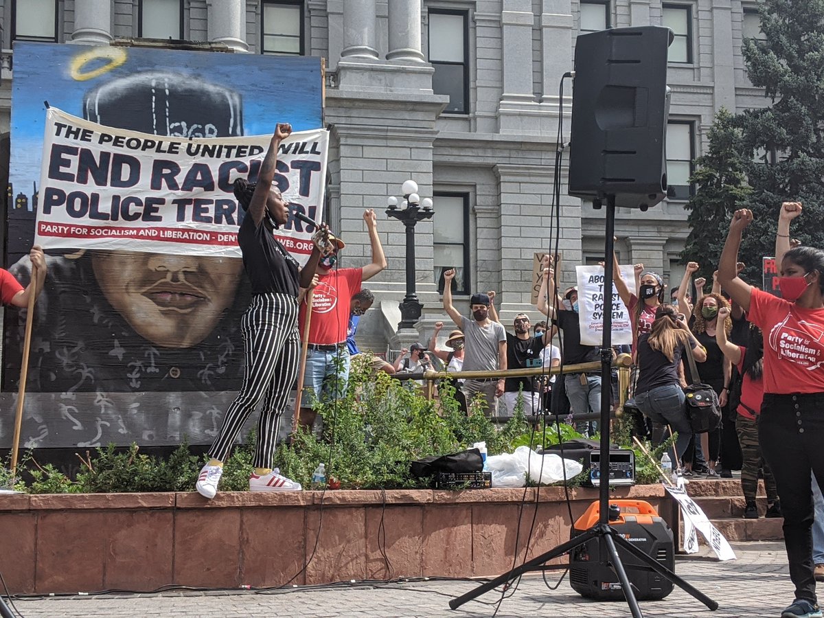 "Now I want you so loud your ancestors can hear" Leading the crowd in chanting Assata Shakur's refrain:“It is our duty to fight for our freedom.It is our duty to win.We must love each other and support each other.We have nothing to lose but our chains.”