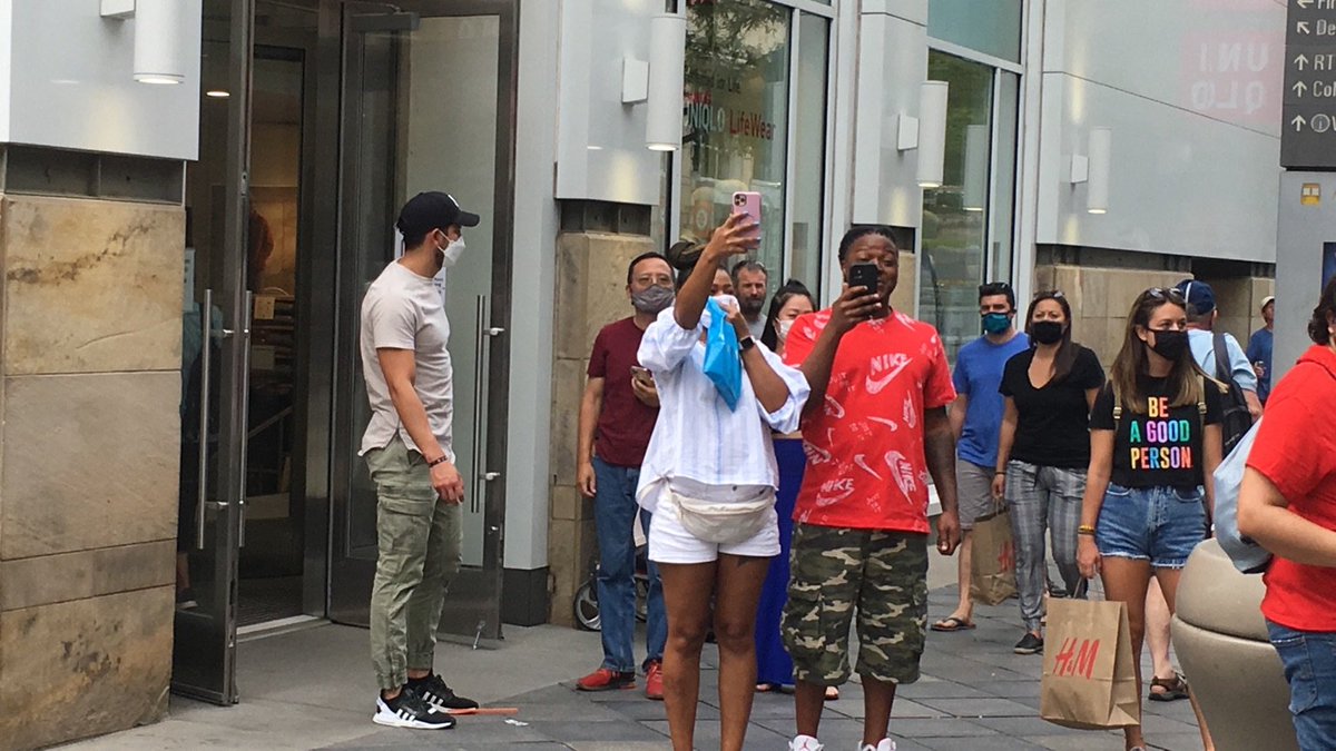 Bystanders cheering on the anti-racist march or joining as it passes  #DropTheChargesCO