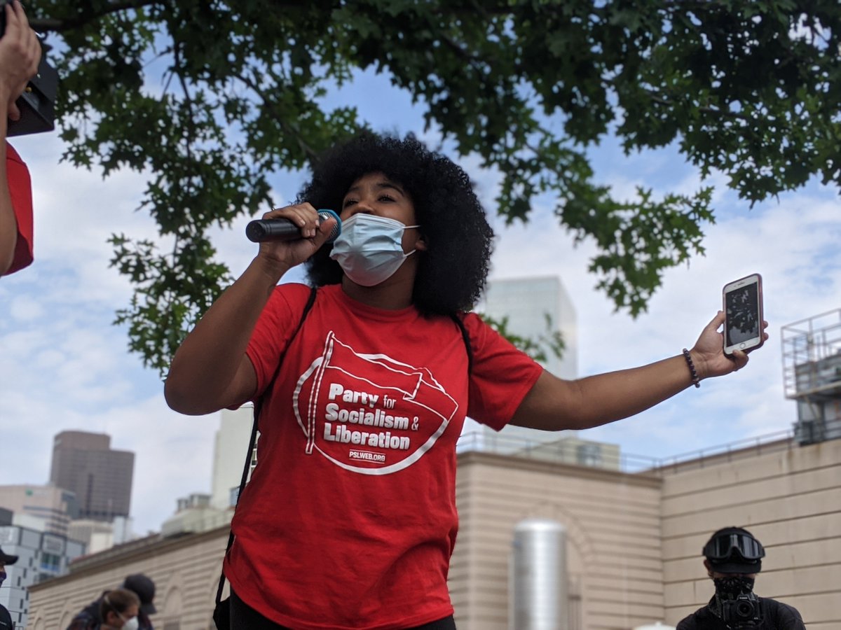 Next up, Nina on the mic.“They are behind bars for crimes they did not commit!DPD, miss me with those bullshit charges!”