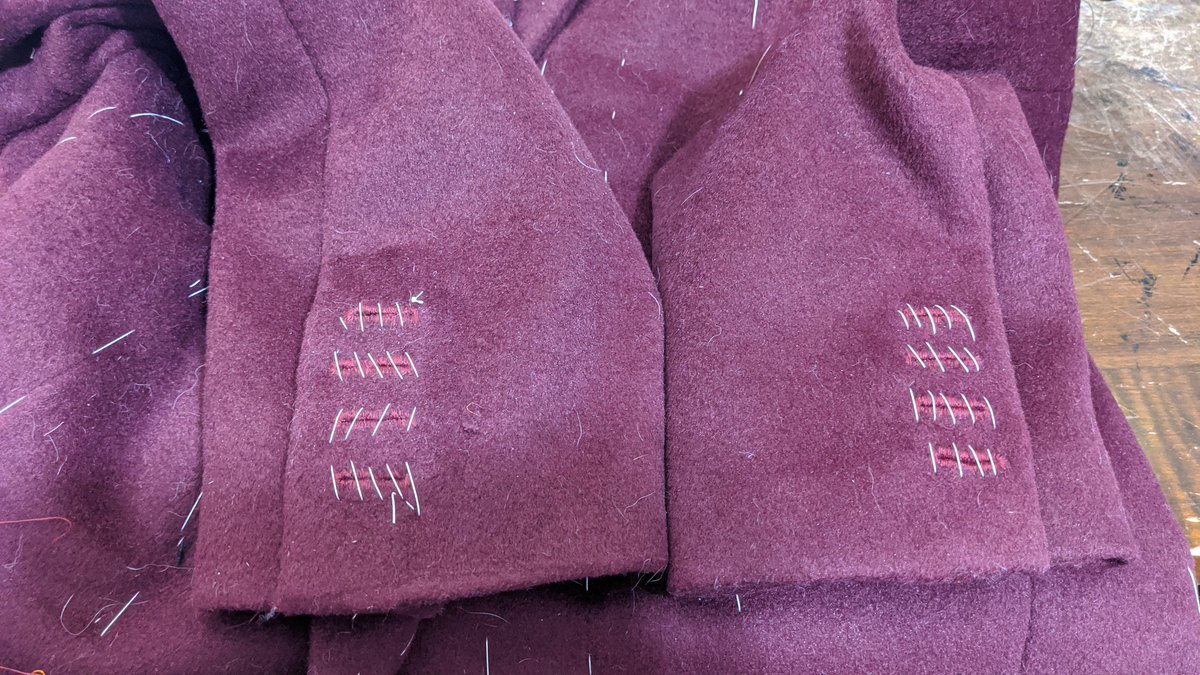 The other side is much better lol. Basted them both shut in advance of the final press. Just the front buttonholes left!