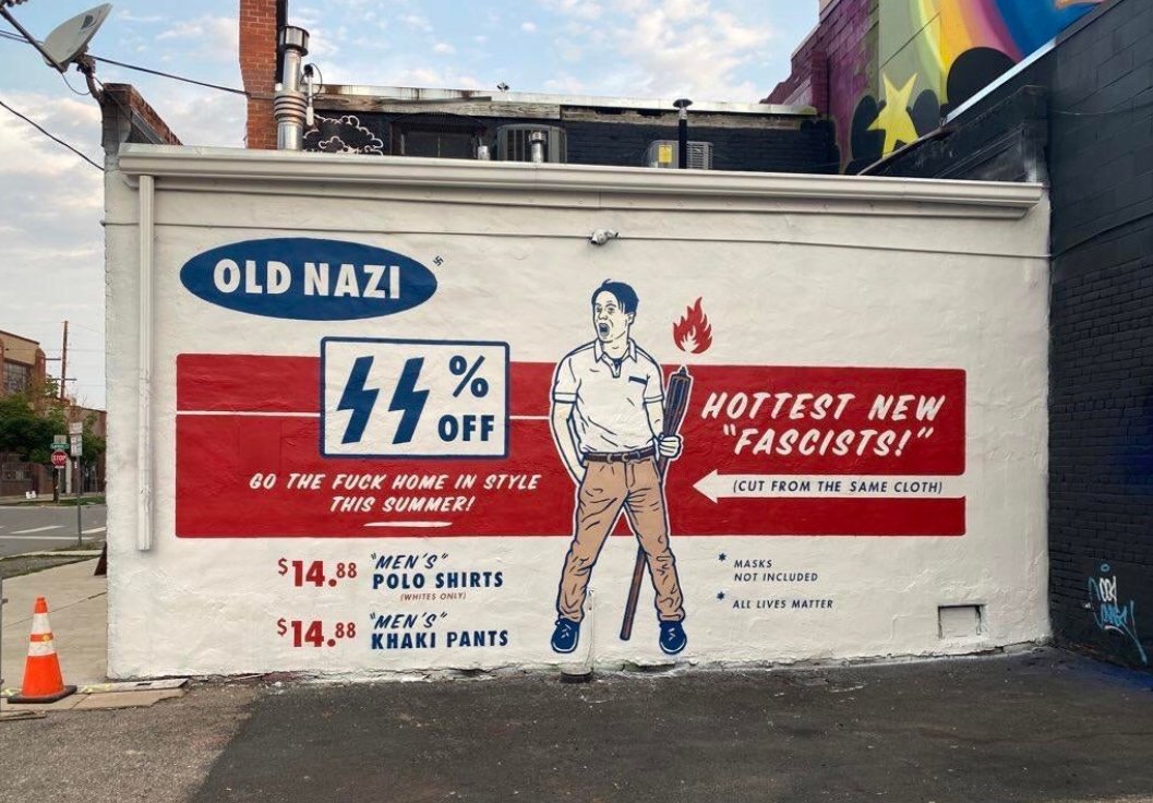 So uh,,, this mural by Scot Lefavor went up in Denver at the crushed walls mural festival today. It looks like it's supposed to be an anti-fascist parody of the Nazis who marched on Charlottesville 3 years ago but what it mostly effectively communicates is fascist symbolism.