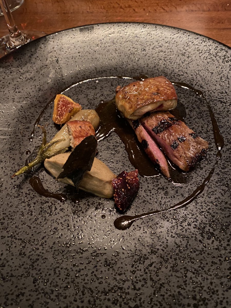 Some kind of pork that only ate acorns in a whiskey barrel soy sauce reduction sauce something with baby eggplant, roasted fig, and eel