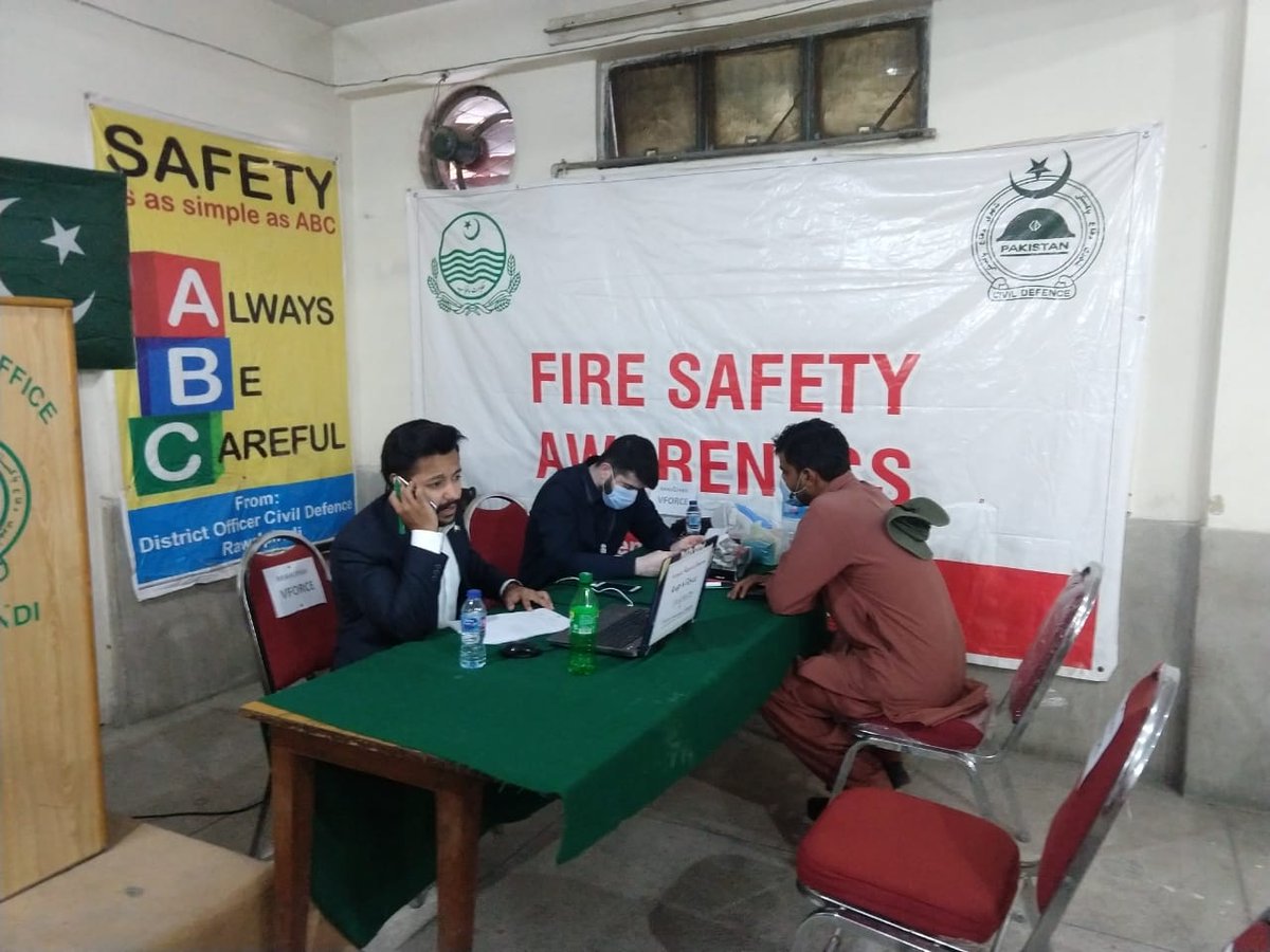 RwpVForce's tweet photo. Rawalpindi V-Force works with the District Administration in various areas of the city. Asst. Chief Coordinator, Kaleem Tahir with Sher Ali, Asst. Director HR welcomes a volunteer (&amp; other's) in yesterday's Orientation &amp; ID Card Distribution Event #SundayThoughts #VForceUpdates https://t.co/UJBmLDh4km