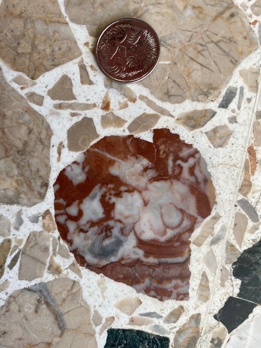 Red limestone. Love a bit of hematite in my limestone. I want this to be from the Devonian. Is there life hiding in there? A former sponge?