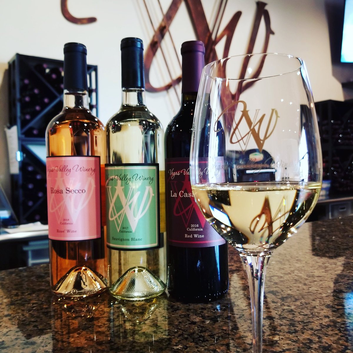 VegasWinery's tweet photo. It's Sunday!! That means any 3 bottles gets you a free glass of wine! #stockupsunday #vegasvalleywinery #wine #cider #winetasting https://t.co/mkbSeighGm
