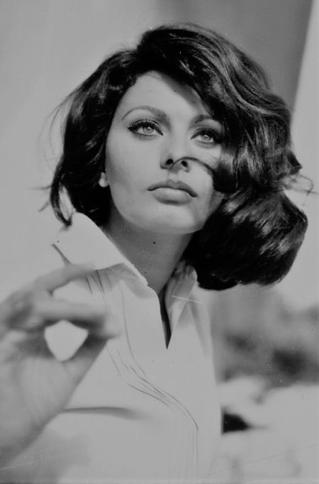  Nothing makes a woman more beautiful than the belief that she is beautiful. Happy birthday, Sophia Loren! 