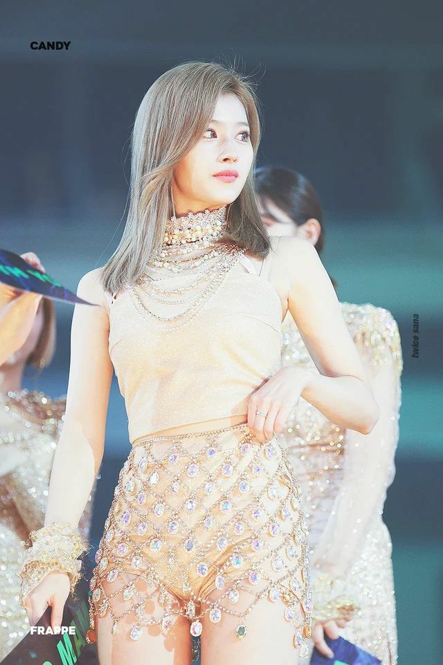Sana always gets the shortest dresses on stage witch make her unconfortable at dancing but in general her outfits are nice .
