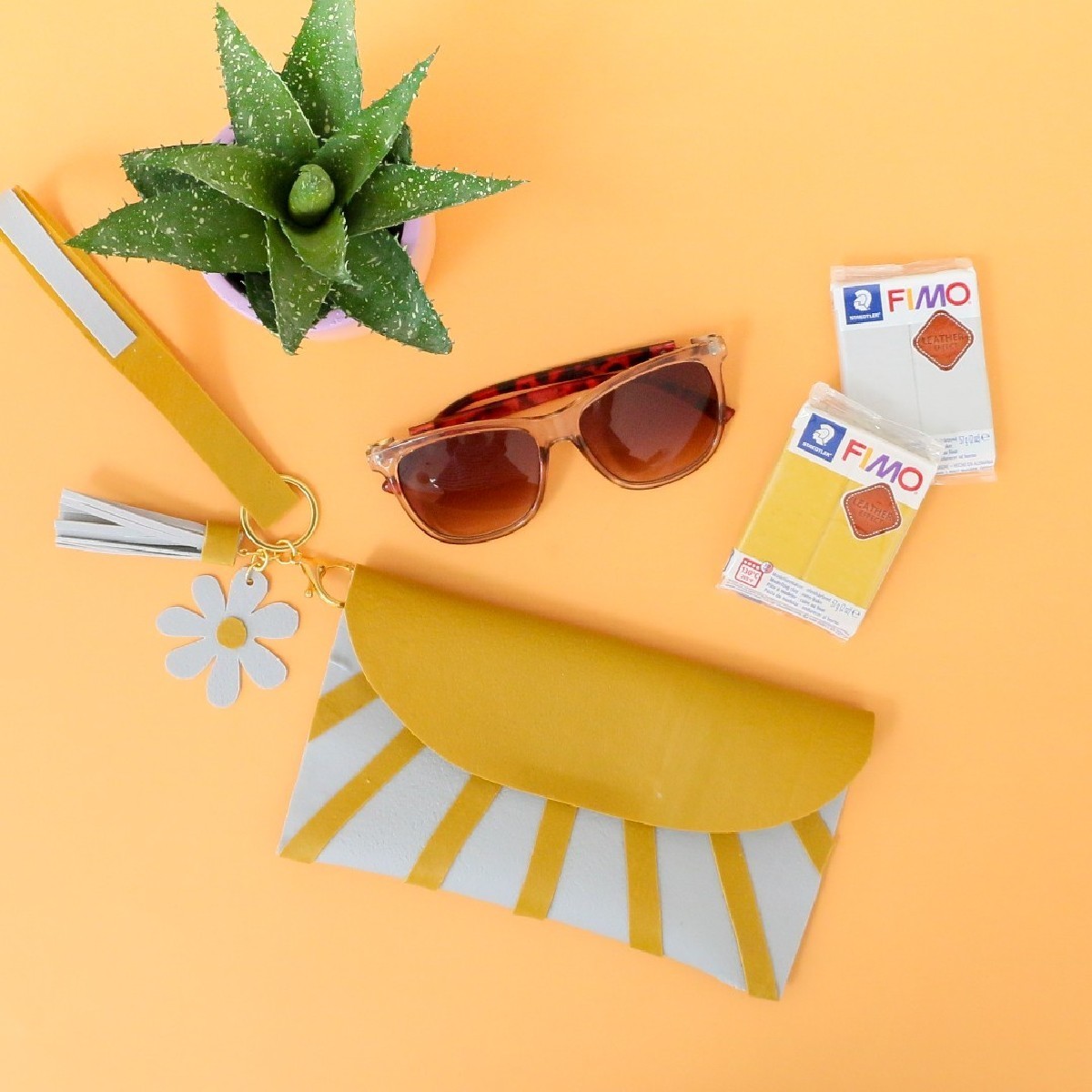 DIYer and designer, Kara Whitten, displays a bright ray of sunshine with this super cute purse she created using the new FIMO leather-effect oven bake clay. 

Follow <a href="/STAEDTLERNA/">STAEDTLER-Mars NA</a> for more fun projects and to find your inspiration.