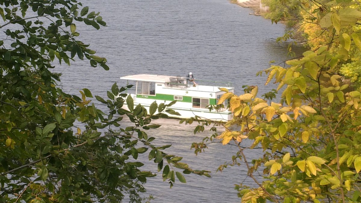Here is the stolen houseboat off the north tip of Nicollet Island in the Mississippi River