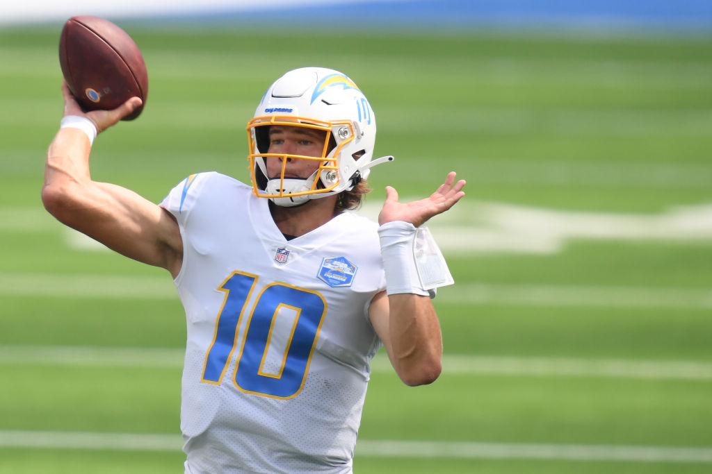 Justin Herbert becomes the first player in NFL history with a rush and pass TD in the first half of their debut game since 1954.

A literal historic start.