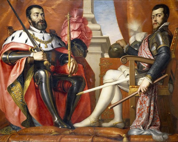 "Al Emperador César Carlos V Augusto, vencedor de Francia, África, Sajonia. Señor de las islas y tierra firme del Nuevo Mundo, perpetuo defensor por mar y por tierra de la república cristiana contra los turcos, Felipe rey su hijo al padre nunca vencido y a su memoria eterna"