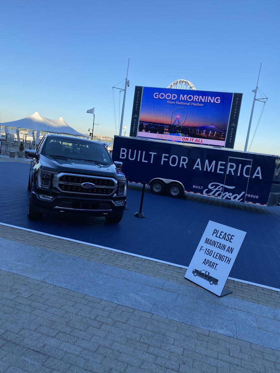 caseygroup's tweet image. Good social distancing advice #BuiltForAmerica #BuiltForDC. The 2021 Ford #F150 #Hybrid on display at @NationalHarbor this morning.