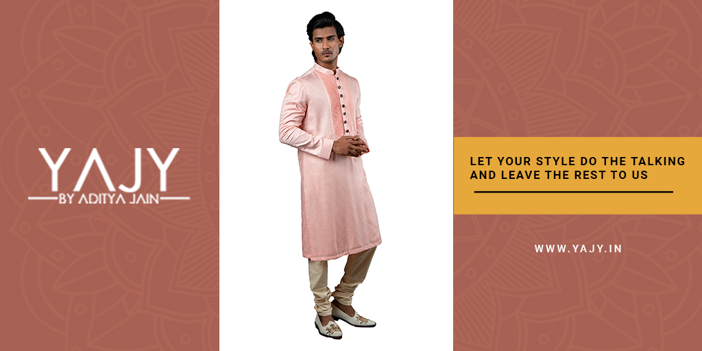 This baby pink self embroidered kurta, embellished with metal buttons and pintuck detailing can be styled with ivory colour churidar, is a perfect match for the upcoming wedding affair.
.
#yajy #indiangroom #indiangroomswear #MadeInIndia #menskurta #weddingdaylook #menswear