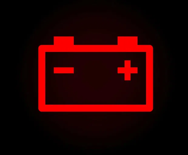 This is the battery warning light. It is normal for it come on wen you just turn on the car but if it stays on while you are driving, that means a fault as been detected in the charging system and your car will die soon. Find somewhere to park and check your battery.