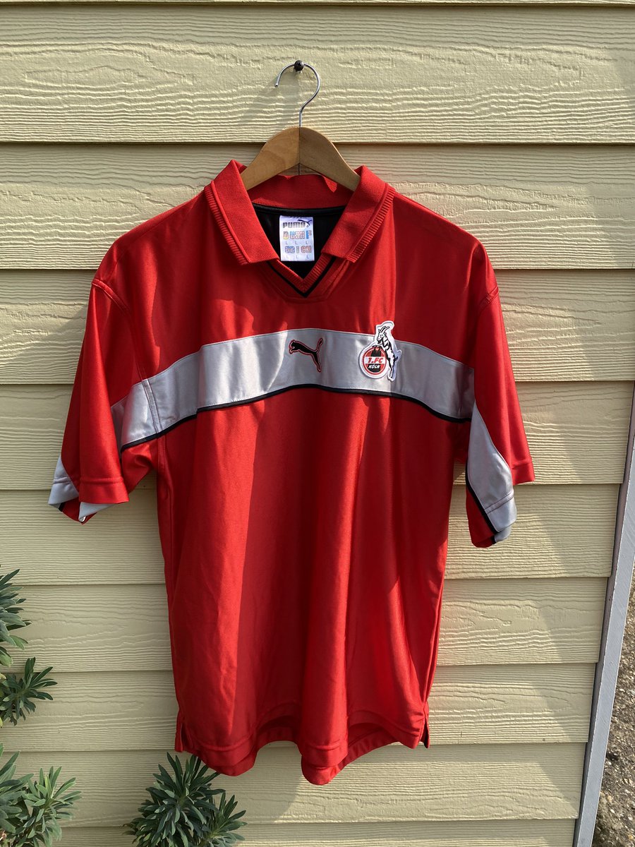 getshirtyHD's tweet photo. At GSHD we love our footy garms, &amp; every so often one pops up we can’t find any details on! Can any fellow footy heads help in ID’ing this beaut from FC Koln &amp; Puma? Tag seems to date to 98/00 but this doesn’t match a kit worn by the German outfit? https://t.co/4UHBm1v2ek