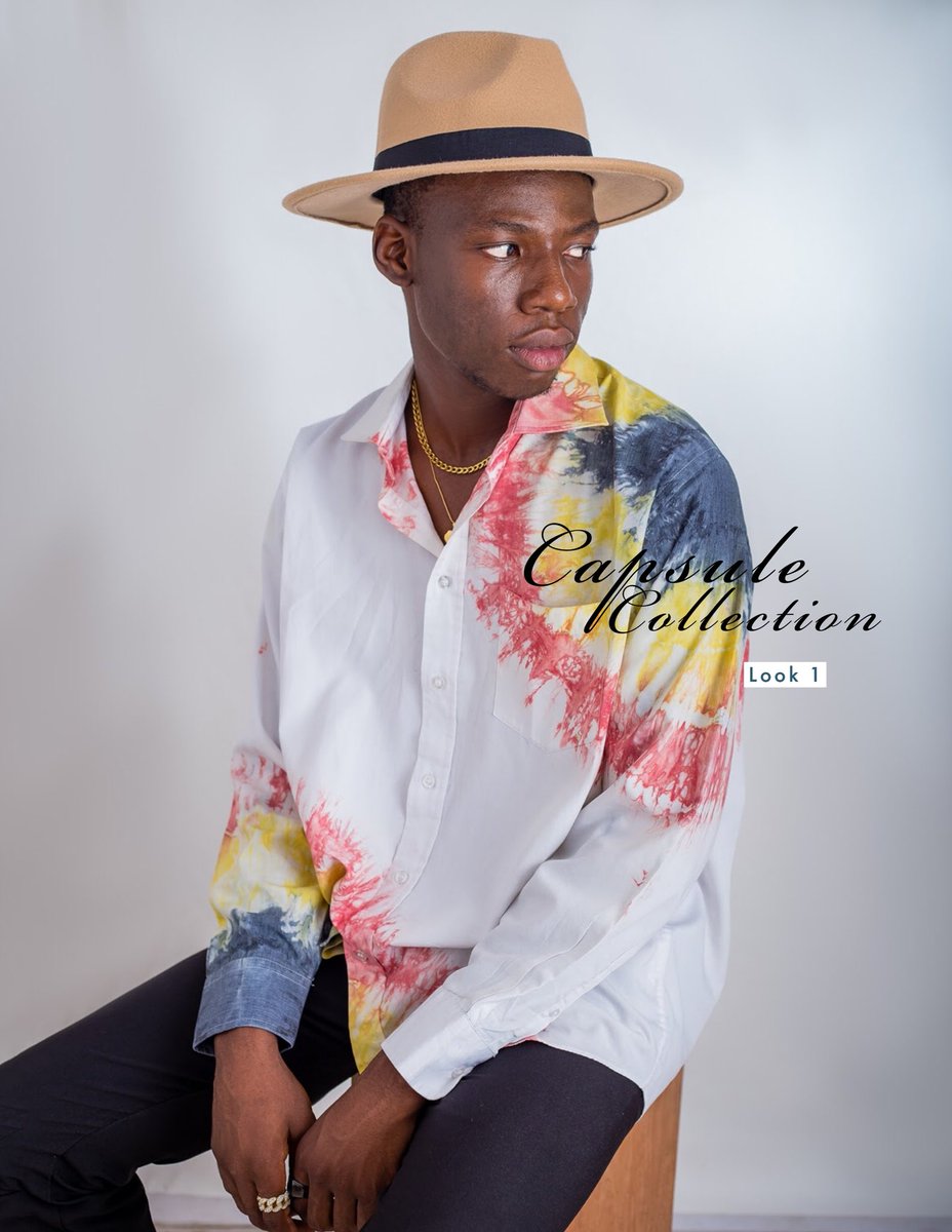M.O.N.D.A.YWe have our model in a CRISP white shirt with a splish splash of yellow and red and a little bit of black to cool it down some gold accessories and a statement hat to finish off that looks that have beads turning in your direction all day long!Shirt-6,000 #adire