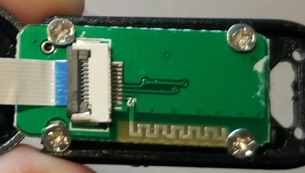 The other side shows that there's one more feature on this PCB: the bluetooth antenna! You don't usually see those on the end of a ribbon cable, but it works I guess.