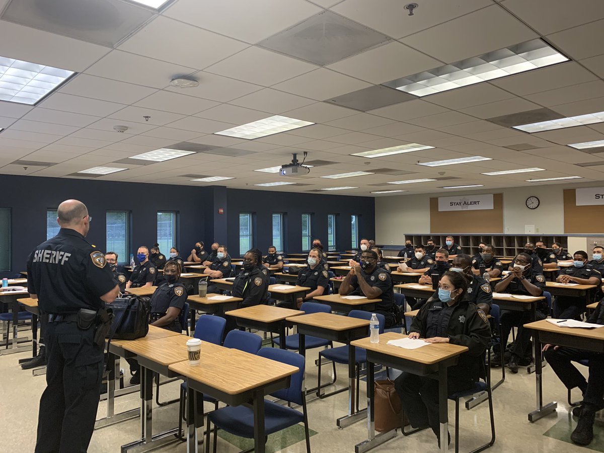 HCSO_MikeLee's tweet photo. We welcome our new lateral class to the @HCSOTexas family. “Our community needs you,” says Chief Navarre. Our lateral class will go through 2 months of training w/ @HCSO_PatrolFTO before going out to serve our community. #HCSOProtecting #HCSOCares https://t.co/dwYiuWagI5
