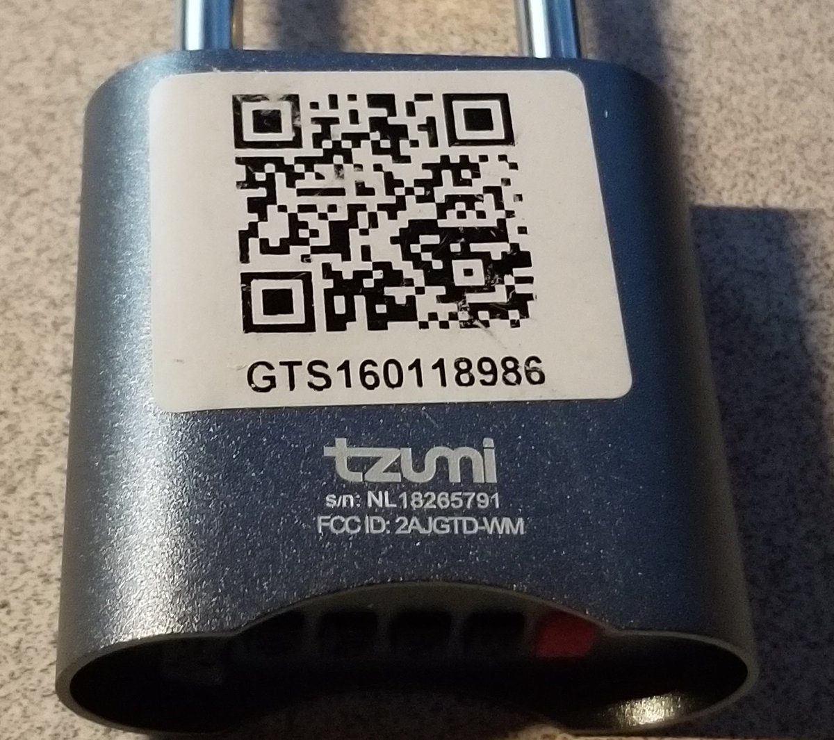DUN DUN DUN! I have violated all the warrantees and now Tzumi is crying.It's the QR code for this lock! And yes, this lock has a FCC ID. That's a bad sign.