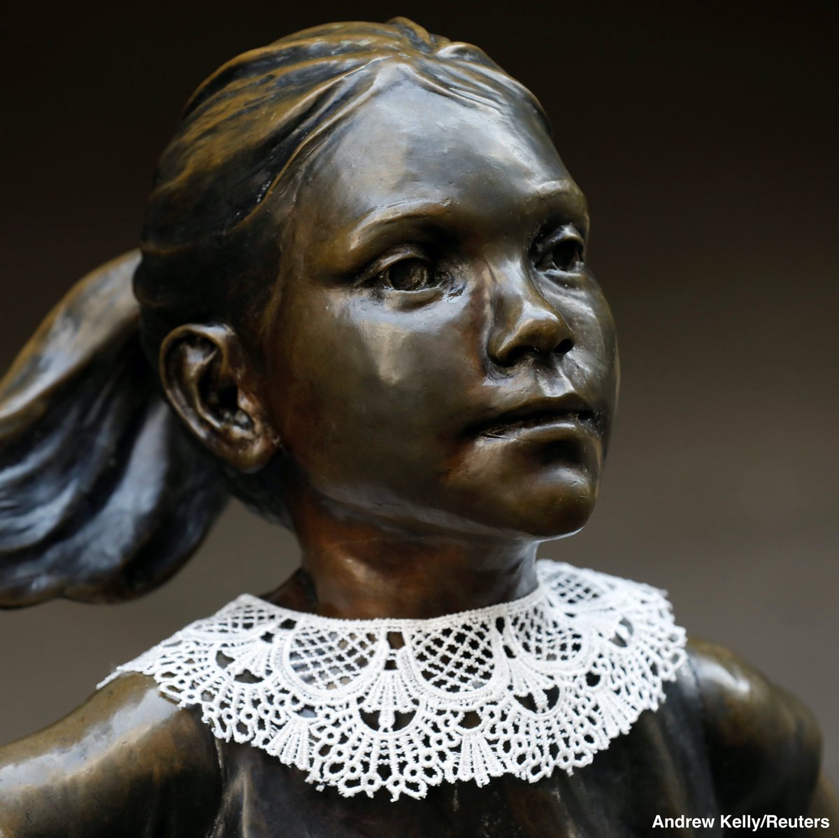 A jabot collar is placed on the Fearless Girl statue in New York's financial district in honor of the late Supreme Court Justice Ruth Bader Ginsburg. abcn.ws/33Q2mZ4