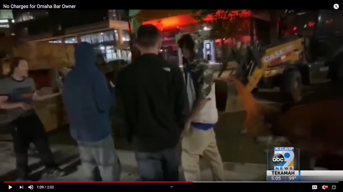 Jake Gardner ran over and displayed a pistol IN HIS WAISTBAND (left), telling the rioters to back off.HE DID NOT PULL IT OUT AND BRANDISH IT.He was trying to DEFEND HIS FATHER.