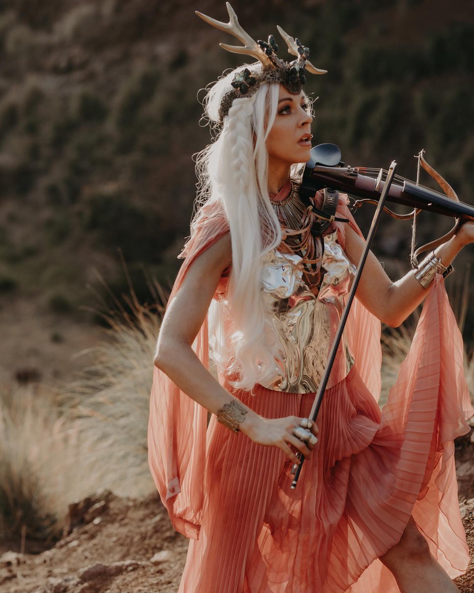 LindseyStirling's tweet photo. It’s out! Watch my most action packed music video ever for Til The Light Goes Out https://t.co/6tidweFWIY https://t.co/s7WToZhRKC