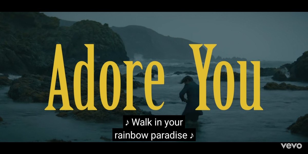 Saying "walk through your rainbow paradise" in the very first line establishes a strong message. This combined with H saying it's a love song about the initial stages of meeting someone and referring to the fish as a HE.