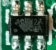 This over here... I'm not really sure.It's an AD5?27, but I'm guessing just by how this is hooked up that it's a motor driver.