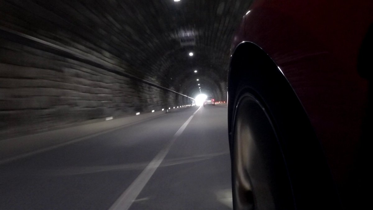 A whole groupe of classic tractors and another Model 3.In the middle of that tunnel you cross from Salzburg into Carintha.