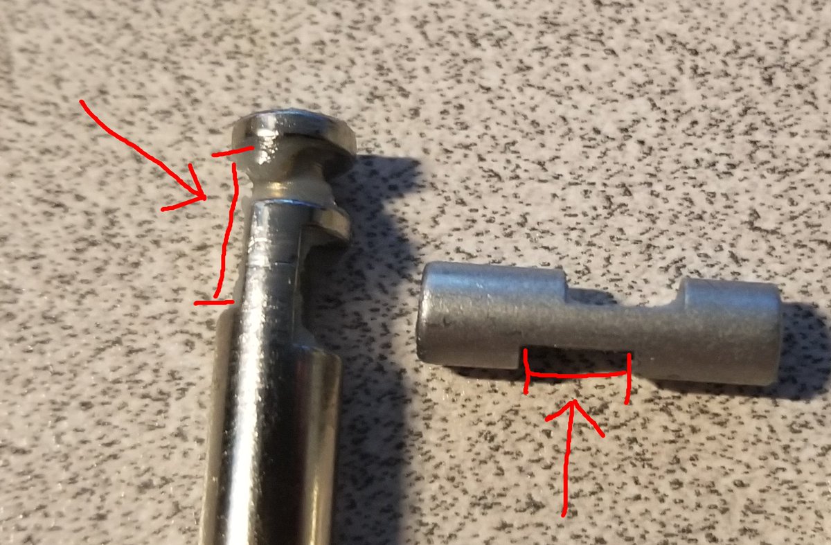 The two pins? They go here and here.One keeps the slide from sliding too far back or two far in, and the other keeps the shackle from popping out when the motor ejects it.