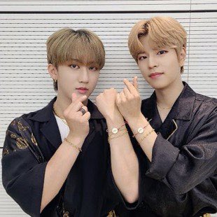 Stray Kids wearing bracelets from the “Save the Children” campaign