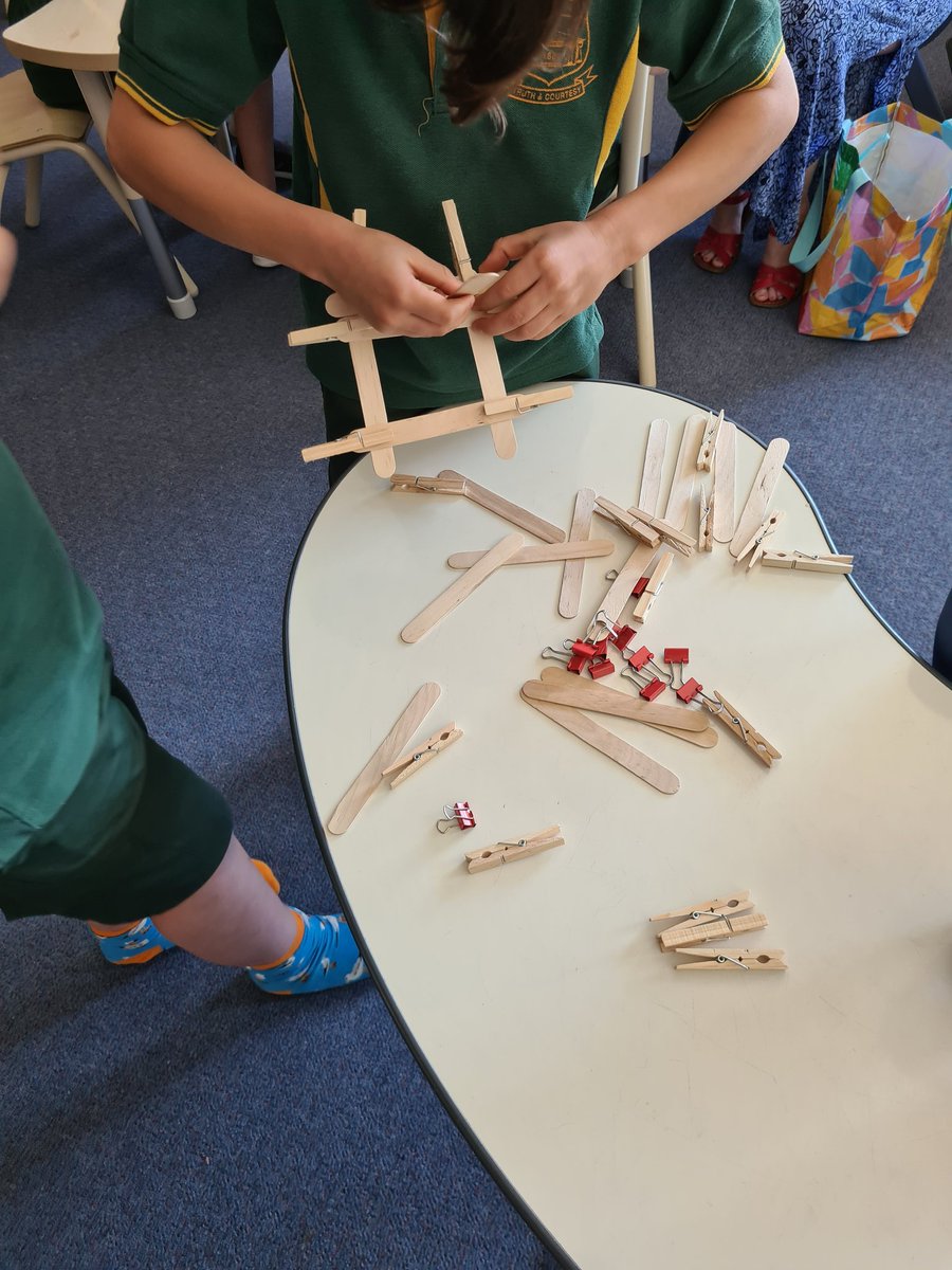 STEM Challege! We are building different types of structures to support weight. 'We need to test it to see if it's secure' D.Y