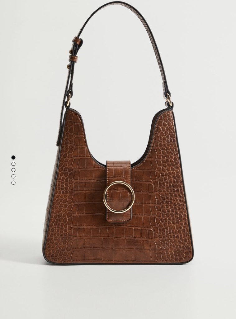 Croc Effect BagN29,000N.B. Prices are subject to change because of the ongoing sales.It has a faux Croc leather, short strap, inner pocket and inner lining! Comes with a magnetic metallic fastening. Slim and perfect! Your daily essentials can fit into this bag. Send a DM