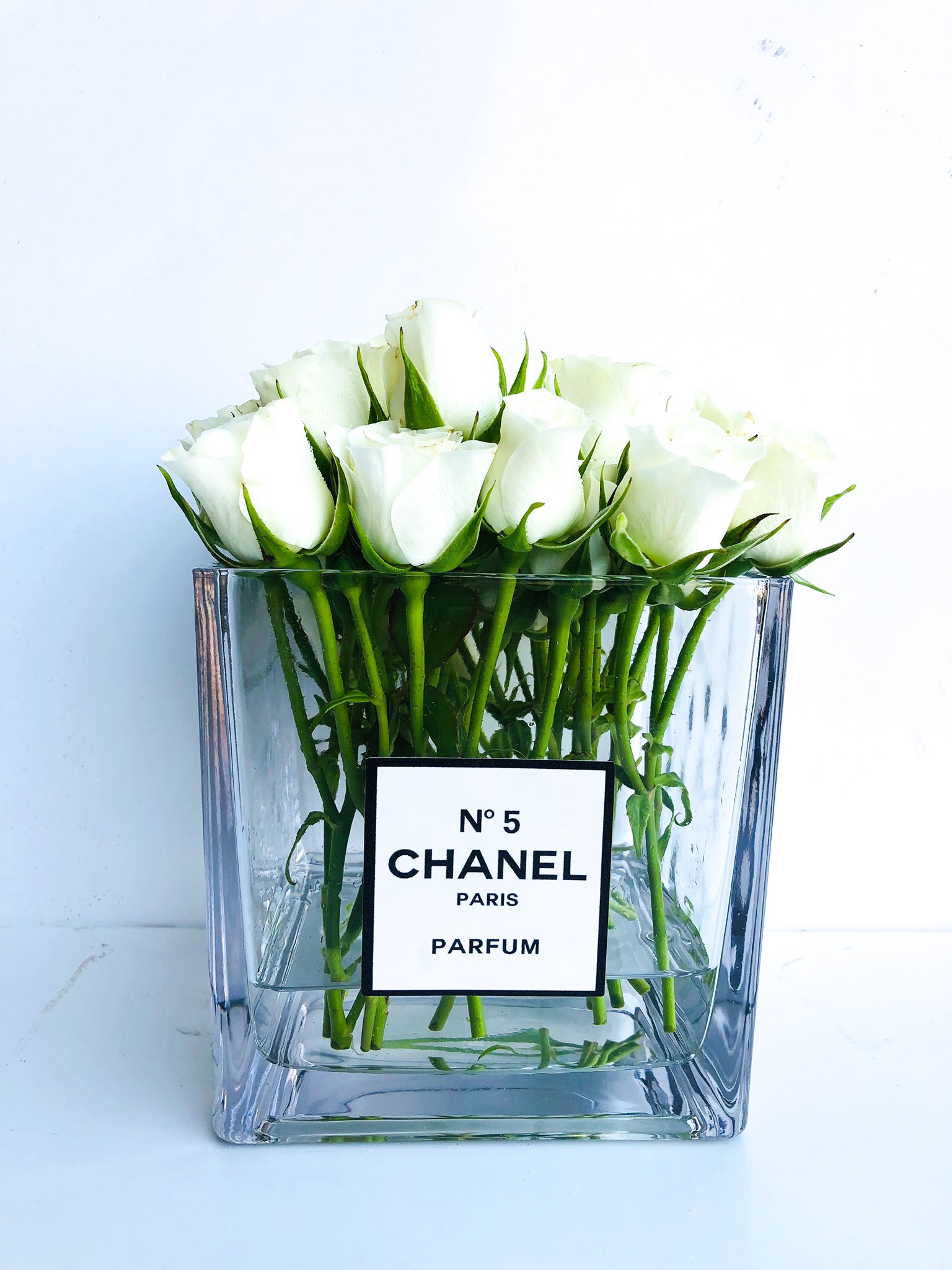 Karibu Flowers on X: Weekly Special// Chanel Inspired Square Vase with  White Spray Roses for only $350. Only 5 left. Shop at   while stocks last.  / X